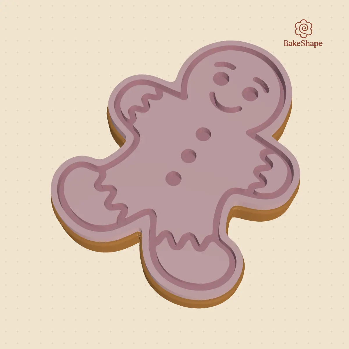 A decorated gingerbread man cookie made with a BakeShape cutter and stamp